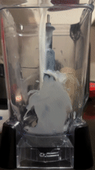 Late-night smoothie preparation captured in Mexican kitchen