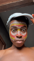 Traditional face paint and birds observed in Nkpor Nigeria