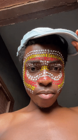 Traditional face paint and birds observed in Nkpor Nigeria