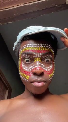 Traditional face paint and birds observed in Nkpor Nigeria
