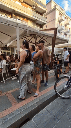 Outdoor café crowd watches soccer in Argentina