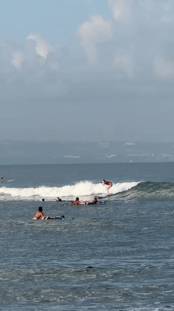 Surf session and beach activity at North Kuta, Bali