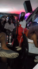 Nightclub gathering with rapper, masked performer documented in Nigeria