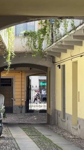 Milan neighborhood scenes captured during sunny morning walkabout