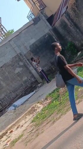 Morning scenes in Lagos show street musician, construction activity
