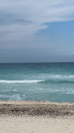 Beach scene recorded in Cancún showing turquoise waters