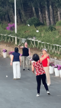 Evening shuttlecock game captured in Da Lat, Vietnam