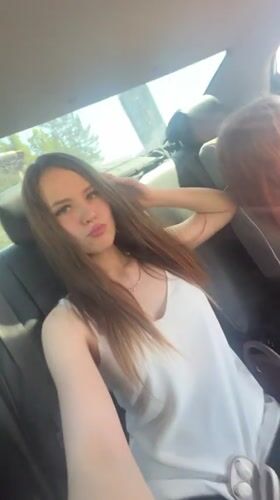 Woman filmed in car backseat in Noviy, Russia