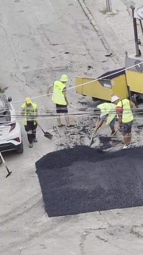 Street repaving crew in action, Varna, Bulgaria