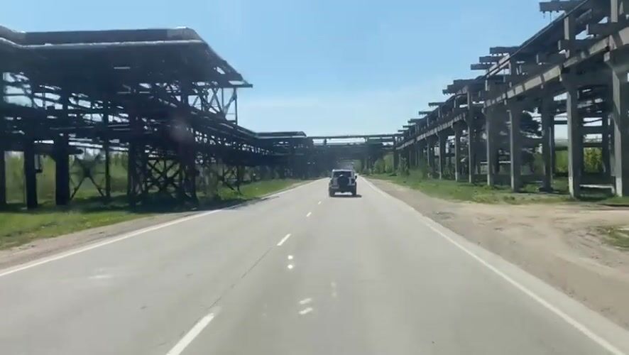 SUV travels industrial road in Angarsk, Russia