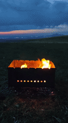 Barbecue grill burns in field in Urozhainyi, Russia