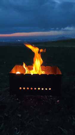 Barbecue grill burns in field in Urozhainyi, Russia