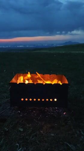Barbecue grill burns in field in Urozhainyi, Russia