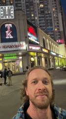 Man photographed smiling at camera in Saint Petersburg