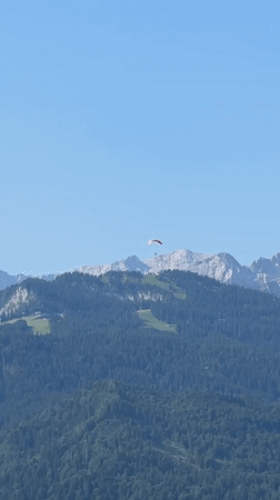 Balcony morning in the Bavarian Alps, paraglider included