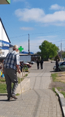 Elderly man with cane observed near dilapidated building in Sennoy