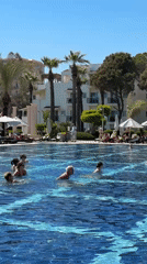 Resort pool activities and selfie captured in Serik, Turkey