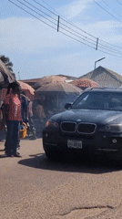 Daily street life and market activity documented in Narayi
