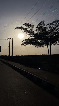 Sunny day captured on video from roadside in Nigeria