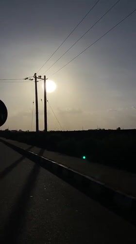 Sunny day captured on video from roadside in Nigeria