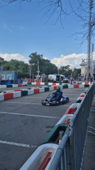 Go-kart racers compete on makeshift street course