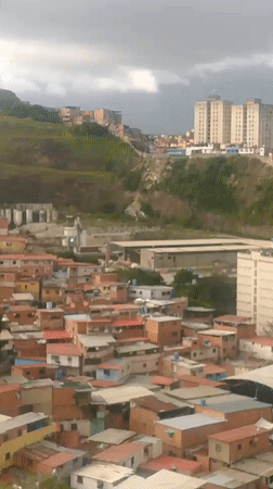 Evening views across Caracas hillsides and city streets