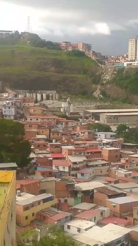 Evening views across Caracas hillsides and city streets