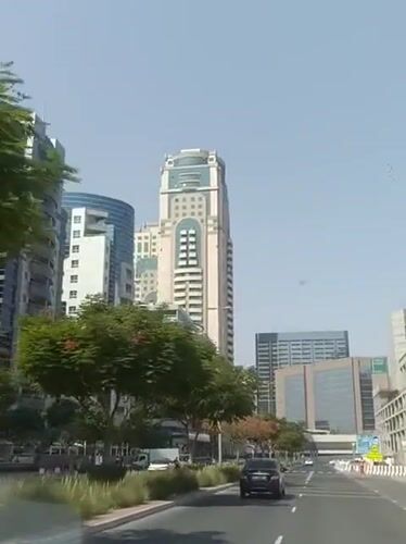 Morning drive through Dubai's urban streets and highways
