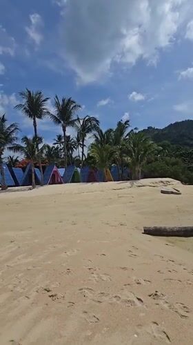 Koh Samui beach strip: cabins, flags, and a monkey mural
