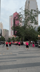 Public square dance group performs in Chengdu district