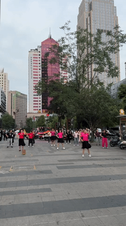 Public square dance group performs in Chengdu district