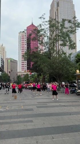 Public square dance group performs in Chengdu district