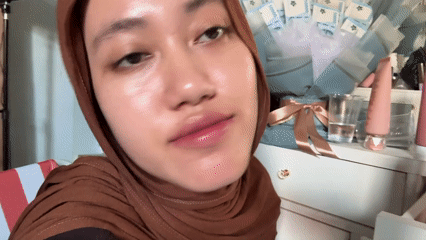 Woman poses for multiple photos in Gadingrejo Indonesia