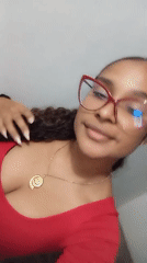 Woman in red glasses, top spotted in Juan Griego
