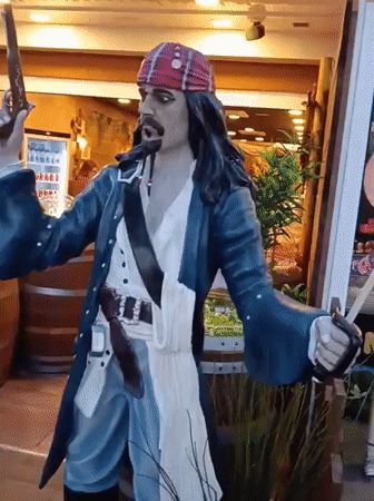 Tourist explores Puerto Del Carmen attractions and streetscapes during evening hours