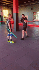 Group boxing drills and sparring in a gym