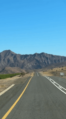 Road toward mountains captured on video in Namibia