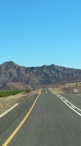 Road toward mountains captured on video in Namibia