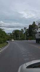 Passenger-seat view of road traffic in Ko Samui