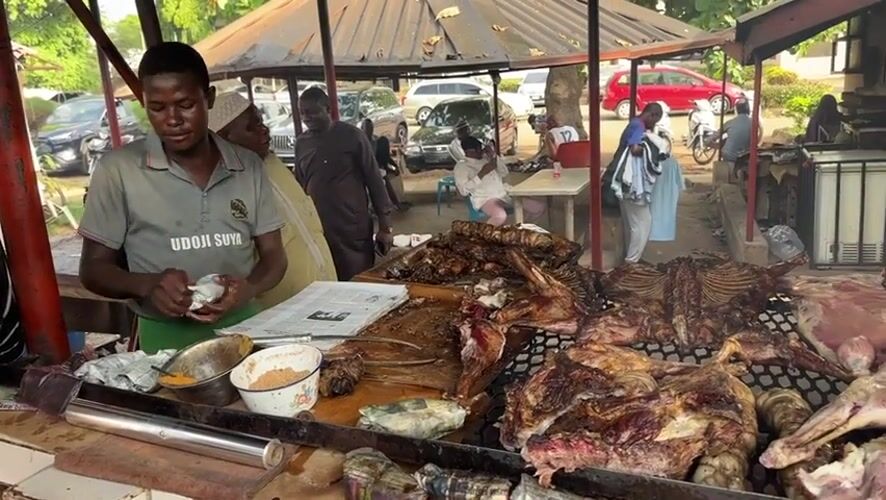 Nigerian livestock market and meat vendors documented in operation