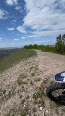Motorcyclist captures scenic overlook of Russian town from hilltop