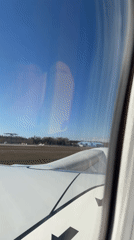 Aircraft passenger films clear day at Skulte Airport Latvia