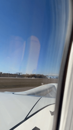 Aircraft passenger films clear day at Skulte Airport Latvia