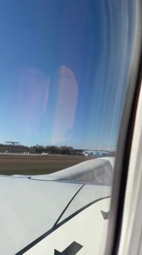 Aircraft passenger films clear day at Skulte Airport Latvia