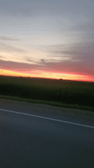 Sunset, road trip, and a hashtag graphic in rural Kanevskaya