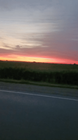 Sunset, road trip, and a hashtag graphic in rural Kanevskaya