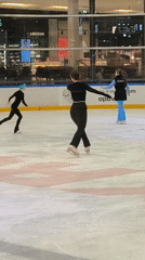 Spin practice at an indoor ice rink in Riga