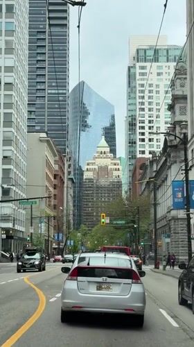 Silver Honda Insight spotted in Vancouver evening traffic
