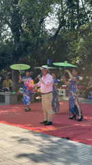 Street performers stage outdoor show in Qingyang District park