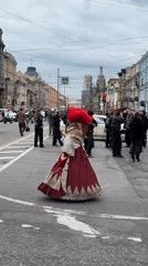 Nevsky Prospekt buzzes on a cloudy Saint Petersburg afternoon